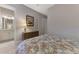 Spacious bedroom with ensuite bathroom access and dresser at 5401 Manchini St, Sarasota, FL 34238