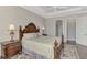 Comfortable bedroom with a king-size bed and en-suite bathroom at 5401 Manchini St, Sarasota, FL 34238