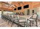 Large, well-equipped bar with high-top seating at 5401 Manchini St, Sarasota, FL 34238