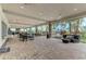 Spacious covered patio with seating and fireplace at 5401 Manchini St, Sarasota, FL 34238