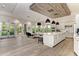 Bright and spacious community room with kitchen and seating at 5401 Manchini St, Sarasota, FL 34238