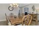 Elegant formal dining room with wood table and chandelier at 5401 Manchini St, Sarasota, FL 34238