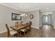 Elegant dining room featuring a wood table and chandelier at 5401 Manchini St, Sarasota, FL 34238