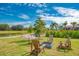 Relaxing fire pit with wooden chairs at 5401 Manchini St, Sarasota, FL 34238
