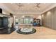 Fitness room with strength training equipment and a wood floor at 5401 Manchini St, Sarasota, FL 34238