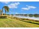 Scenic lake view with lush greenery and homes at 5401 Manchini St, Sarasota, FL 34238