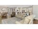 Open living room, with hardwood floors, and views of the kitchen and dining room at 5401 Manchini St, Sarasota, FL 34238