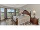 Spacious Primary bedroom with bay window and wood furniture at 5401 Manchini St, Sarasota, FL 34238