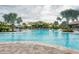 Large community pool with surrounding patio at 5401 Manchini St, Sarasota, FL 34238