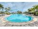 Community pool with plenty of lounge chairs at 5401 Manchini St, Sarasota, FL 34238