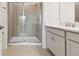 Modern bathroom with double vanity and walk-in shower at 5447 Tripoli Dr, Palmetto, FL 34221