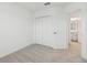 Bedroom with carpet, double-door closet and access to bathroom at 5447 Tripoli Dr, Palmetto, FL 34221
