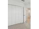 Spacious bedroom with double door closet and access to hallway at 5447 Tripoli Dr, Palmetto, FL 34221