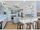 Updated kitchen featuring stainless steel appliances and light blue cabinets at 5544 Dinah Ln, Sarasota, FL 34231