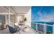 Outdoor balcony with seating area and grill, featuring amazing water views at 555 Quay Cmn # 1105, Sarasota, FL 34236