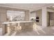 Modern kitchen boasts sleek cabinetry, marble countertops, and high-end appliances at 555 Quay Cmn # 1105, Sarasota, FL 34236
