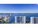 Aerial view of waterfront property with expansive bay and bridge views at 555 Quay Cmn # Ph2002, Sarasota, FL 34236