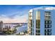 Luxury high-rise building with water and city views at 555 Quay Commons # 402, Sarasota, FL 34236