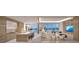 Open concept kitchen and living area with water views at 555 Quay Commons # 402, Sarasota, FL 34236