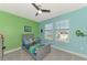 Fun bedroom with a twin bed and colorful decor at 5755 Woodland Sage Dr, Sarasota, FL 34238