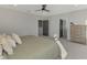 Spacious bedroom with king-size bed and ensuite access at 5755 Woodland Sage Dr, Sarasota, FL 34238