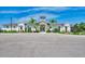 Community center with pool and landscaping at 5755 Woodland Sage Dr, Sarasota, FL 34238