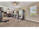 State-of-the-art fitness center with various exercise equipment at 5755 Woodland Sage Dr, Sarasota, FL 34238