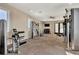 Modern fitness center featuring strength training and cardio equipment at 5755 Woodland Sage Dr, Sarasota, FL 34238