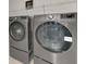 Laundry room with LG washer and dryer at 5755 Woodland Sage Dr, Sarasota, FL 34238