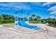 Fun water play area for with slides and sprinklers at 5755 Woodland Sage Dr, Sarasota, FL 34238