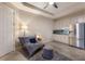 Finished basement recreation room with kitchenette and comfortable seating at 5817 Hevena Ct, Palmetto, FL 34221