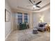 Bright exercise room with large windows and comfortable seating area at 5817 Hevena Ct, Palmetto, FL 34221