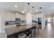 Modern kitchen with stainless steel appliances and granite countertops at 5817 Hevena Ct, Palmetto, FL 34221