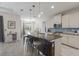Modern kitchen with large island and stainless steel appliances at 5817 Hevena Ct, Palmetto, FL 34221