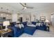 Open living space with sectional sofa and access to kitchen at 5817 Hevena Ct, Palmetto, FL 34221