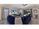Relaxing living room with sectional sofa and access to patio at 5817 Hevena Ct, Palmetto, FL 34221