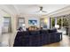 Spacious living area with sectional sofa and backyard access at 5817 Hevena Ct, Palmetto, FL 34221