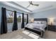 Relaxing main bedroom with ample natural light and ceiling fan at 5817 Hevena Ct, Palmetto, FL 34221