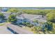 Aerial view of condo building with water access and lush landscaping at 610 Estuary Dr # 610, Bradenton, FL 34209