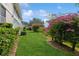 Landscaped backyard with lush greenery at 610 Estuary Dr # 610, Bradenton, FL 34209