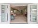 View from balcony into living room and seating area at 610 Estuary Dr # 610, Bradenton, FL 34209