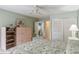 Bedroom with double doors and built-in shelving at 610 Estuary Dr # 610, Bradenton, FL 34209