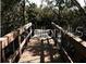 Wooden footbridge leading into a wooded area at 610 Estuary Dr # 610, Bradenton, FL 34209