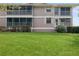 Building exterior showcasing landscaping and lawn at 610 Estuary Dr # 610, Bradenton, FL 34209