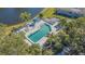 Aerial view of community pool, spa, and deck at 610 Estuary Dr # 610, Bradenton, FL 34209