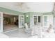 Bright sunroom with table, chairs, and access to living area at 610 Estuary Dr # 610, Bradenton, FL 34209