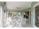 Sunroom with seating area and view of garden at 610 Estuary Dr # 610, Bradenton, FL 34209