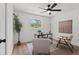 Home office with wood desk and mid-century modern chairs at 710 31St N Ave, St Petersburg, FL 33704