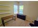 Bright bedroom with a desk and ample storage at 7596 Palmer Glen Cir, Sarasota, FL 34240