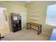 Bedroom with desk, closet, and neutral decor at 7596 Palmer Glen Cir, Sarasota, FL 34240